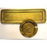 A 19th century Indian brass plate decorated with animals and an Eastern engraved brass tray, plate