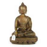 A bronze figure of the seated Buddha, H. 36cm.