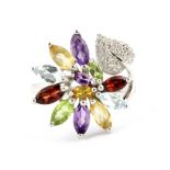 A 925 silver flower shaped ring set with marquise cut amethyst, blue topaz, peridot, citrine and