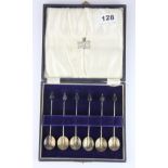 A boxed set of hallmarked silver 1921 coffee spoons.