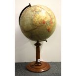 A vintage globe by Dietrich Reimers (pre World War II) on a satinwood stand, H. 52cm.