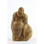 A mid 20th Century Chinese carved soapstone seal of the happy Buddha, H. 9cm.