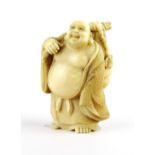 An early 20th century Chinese carved ivory figure of the happy Buddha, H. 7cm.