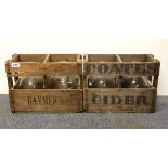 Two vintage cider crates and bottles.