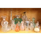 A large quantity of glass perfume bottles, tallest 20cm.