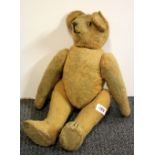 An early articulated teddy bear with non functioning growler, H. 50cm.
