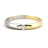 A 14ct yellow and white gold (stamped 585) diamond set ring, (P.5).