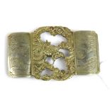 An early 20th century Chinese buckle, W. 9cm.