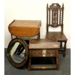 An oak drop leaf table, carved Victorian armchair, a small oak table together with a mirror.