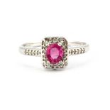 A 9ct white gold cluster ring set with untreated pink sapphires and diamonds, (N).