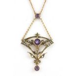 A boxed Edwardian 9ct yellow gold amethyst and seed pearl set necklace, L. 5.5cm.