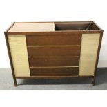 A 1950's Magnovox record player and radio, 113 x 40 x 83cm.