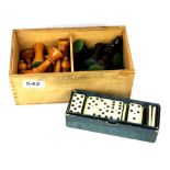 A vintage satinwood and stained wood part chess set, king H. 9cm with a set of dominoes.