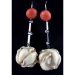 A pair of Japanese carved ivory ojime mounted as earrings on white metal (tested silver) and set