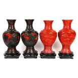 Two pairs of Chinese cinnabar on copper lacquer vases with wooden stands, H. 20cm.