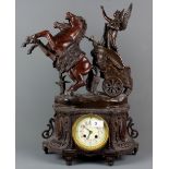 A large 19th Century French bronzed spelter mantle clock, H. 55cm (A/F).