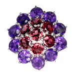 A large 925 silver cluster ring set with amethysts and garnets, (P.5), Dia. 2.5cm.