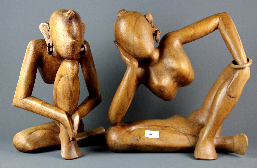 Two carved wooden sculptures, H. 42cm.