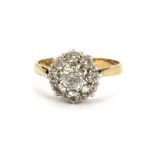 A 9ct yellow gold rock crystal set cluster ring, (O).