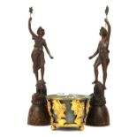A pair of French spelter figures on wooden bases with a gilt metal planter, figure H. 35cm.