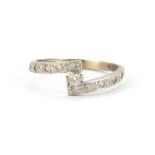 A 14ct white gold (stamped 585) stone set ring, (M).