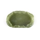 A Chinese carved nephrite jade lotus leaf brush washing bowl, W. 9.5cm.