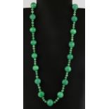 A polished bead necklace imitating jade, L. 30cm.