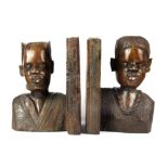 A pair of African carved hardwood book ends, H. 20cm.