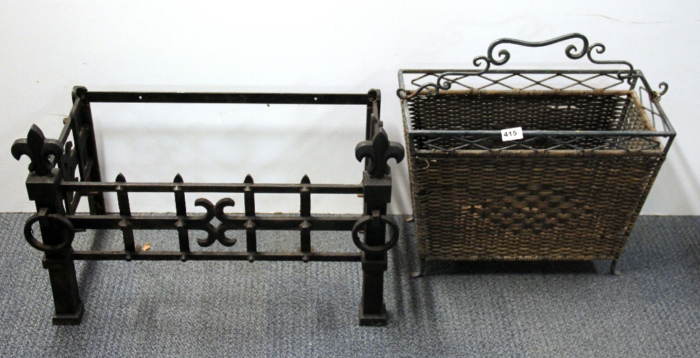 A metal and wicker magazine rack and a log grate.