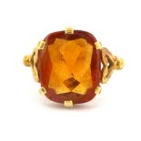An 18ct yellow gold citrine set ring, (O).