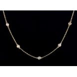 An 18ct rose gold (stamped 750) Diamond by the Yard style necklace set with brilliant cut
