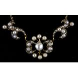 An Edwardian yellow metal (tested 9ct gold) necklace set with pearls and rose cut diamonds, L.