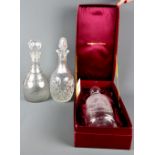 A boxed 1981 Wedgwood Royal Wedding commemorative decanter and two further decanters.