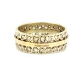 A 9ct yellow gold stone set full eternity ring, (R).