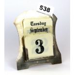 A hallmarked silver desk calendar with celluloid days, months and numbers, H. 12cm.