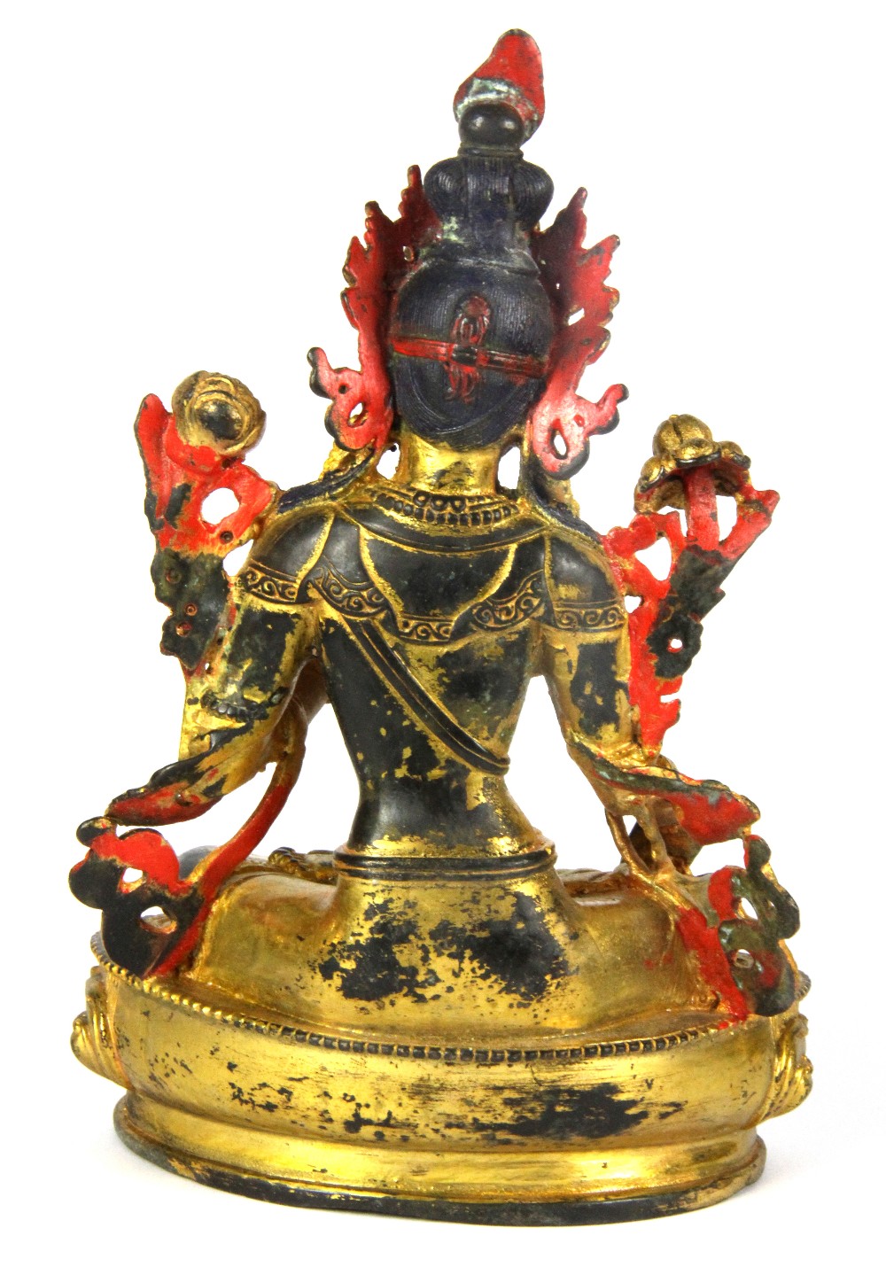 A Tibetan gilt and hand painted bronze figure of a seated Tara, H. 21cm. - Image 2 of 3