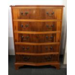 An attractive bow front five drawer chest, W. 75cm H. 105cm.