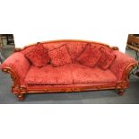 A Victorian carved oak framed couch, W. 225cm.