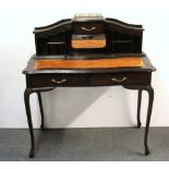 An early 20th century lady's desk with secret compartment to the back of the left drawer, W. 99cm H.