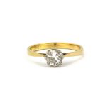 An 18ct yellow gold (satamped 18ct) solitaire ring set with a brilliant cut diamond, approx. 0.75ct,
