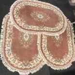 Four matching Indian wool rugs, largest size 135 x 88cm.