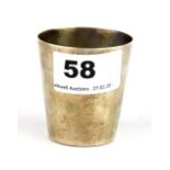 A hallmarked silver stirrup cup, H. 5cm.