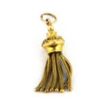 A yellow gold (tested minimum 9ct gold) tassle pendant, L. 3.5cm.