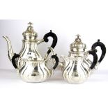 A superb 19th Century Danish four piece silver tea set by Christian Heisse, tallest 23cm.