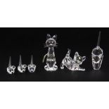 Three Swarovski boxed figures of cats and three mice, tallest H. 5cm.