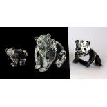 Two boxed Swarovski crystal figures of bears and further Swarovski figure of a panda bear (