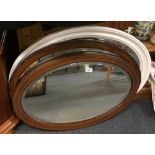 Three oval wall mirrors, largest size 88cm.