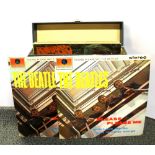 A case of Beatle's 33 RPM LP records.