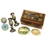 A Victorian brass mounted box, pair of wooden candlesticks, two paperweights and two shells.