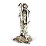 A WMF silver plated figural posy holder of a flower seller, H. 14cm.